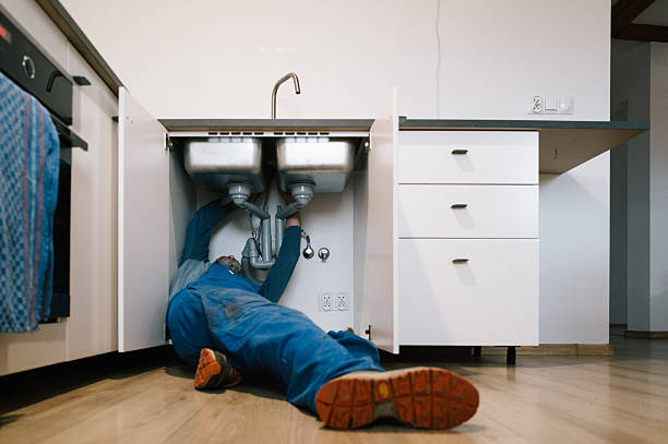 Professional Drain Cleaning technician working in Normalville, PA